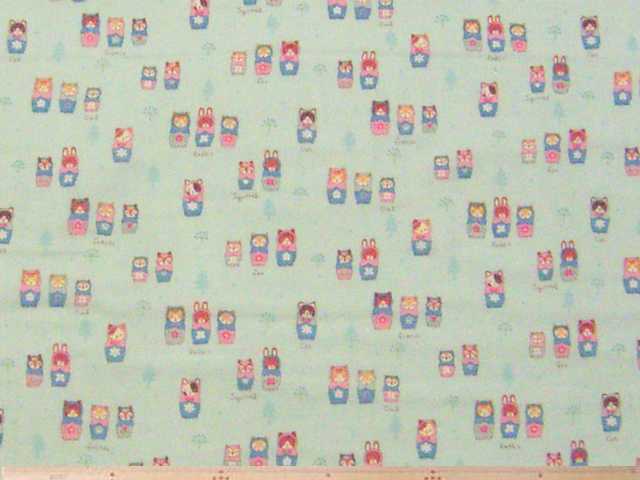 ネコリョーシカ柄コットンダブルガーゼプリント(サックスブルー)