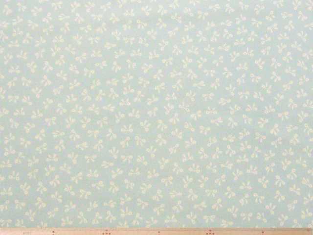 リボン柄・コットンスムースニットプリント（サックスブルー）