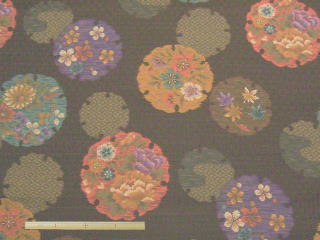 綿・紋ブロハチス和調(絣雪輪草花紋様)プリント(ブラウン)