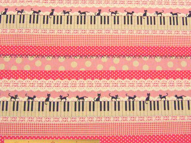 ネコとピアノ柄・綿麻キャンバスプリント(ピンク)